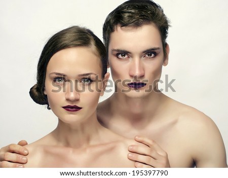 Man and woman naked posing fashion, man wearing make up, comparing a drag queen and a beautiful woman