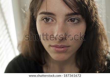 portrait of frightened women , shy, restrained girl