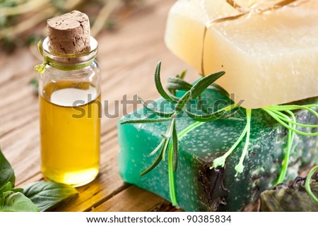 Piece of natural soap with oil and herbs.