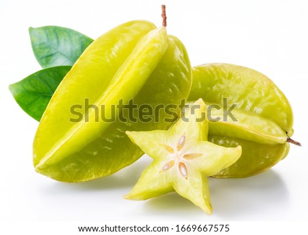 Carambola fruit with slice of star fruit and leaves isolated on a white background. Сток-фото © 