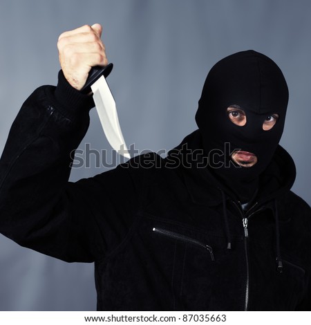 Black Dressed Man With A Knife In Studio Stock Photo 87035663 ...