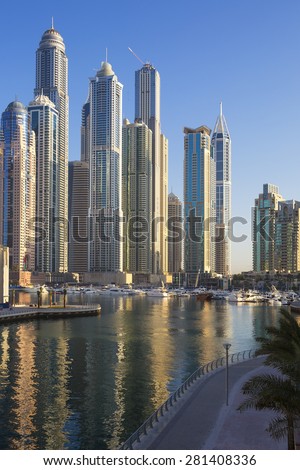 DUBAI, UNITED ARAB EMIRATES - NOVEMBER 11: view of Dubai Marina Towers in Dubai, United Arab Emirates on November 11,2014. Dubai Marina is a district in Dubai and an artificial canal city.