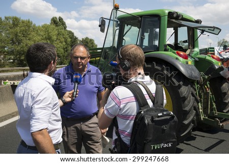 LYON, FRANCE - JULY 23, 2015 : French farmers protest on July 23, 2015 in Lyon. Farmers are demanding better purchase price of their products with great stores.