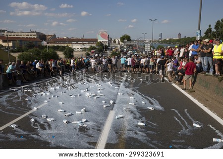 LYON, FRANCE - JULY 23, 2015 : French farmers protest of July 23, 2015 in Lyon. Farmers are demanding better purchase price of their products with great stores.