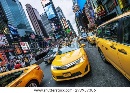 NEW YORK CITY - JULY 9: Taxi on Times Square, an iconic street of New York City and America, July 9, 2015 in Manhattan, New York City. Special photographic processing