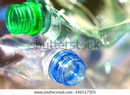 plastic bottles in the trash