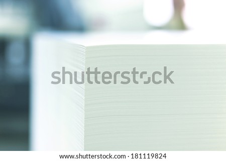 blank sheets of paper in the printer\'s warehouse