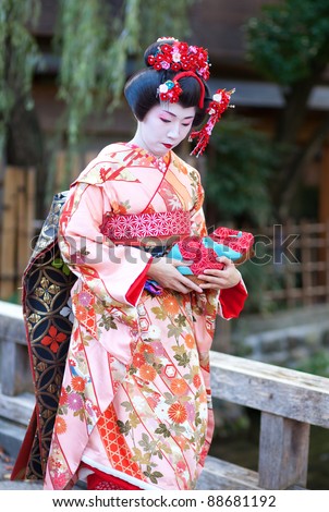 Kyoto, Japan - November 8: Young Maiko In Traditional Clothes Attending ...