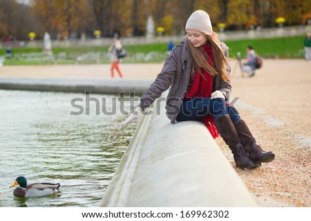 Girl enjoying sunny spring day in Paris