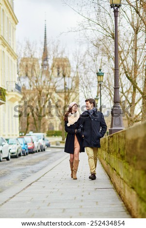 Romantic couple walking together in Paris