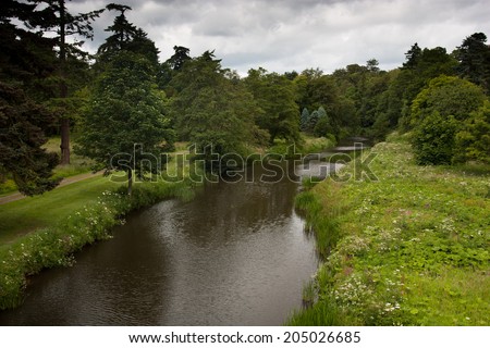 The River Aln as it runs past Alnwick Castle