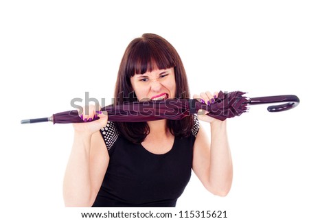 beautiful girl gets angry with umbrella isolated on white background