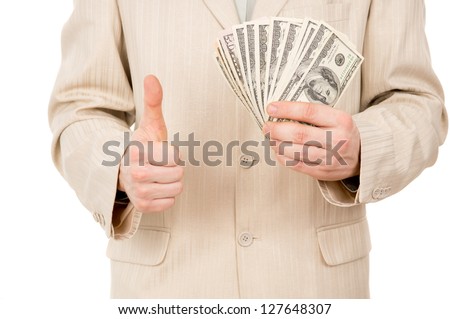 a young man shows that he has is there are us dollars isolated on white background
