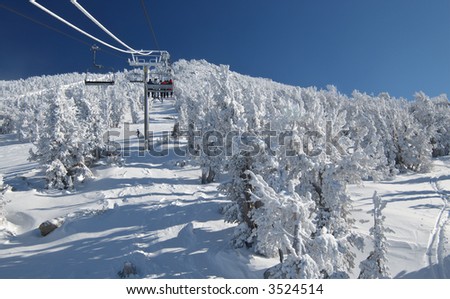 Similar – Foto Bild Skigebiet der Sierra Nevada im Winter, voller Schnee.