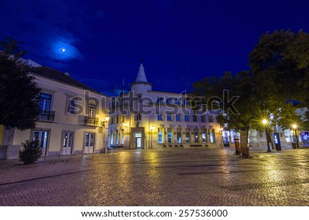 Night view of the park area next to the marina of Faro city, Portugal.