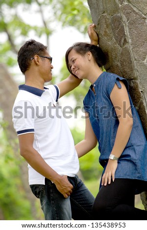 Asian Couple in face to face position