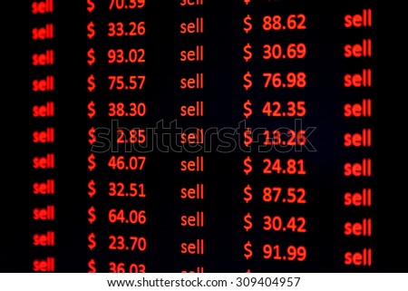 Red financial figures and the word sell on a computer screen. Symbolic of a sharemarket crash.