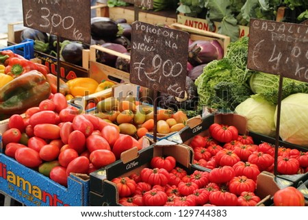 ROME, ITALY - JUNE 3 : Tomatoes for sale at one of the increasingly popular traditional food markets on 3 June 2011 in Rome. The vegetables originate from small scale producers around Rome.