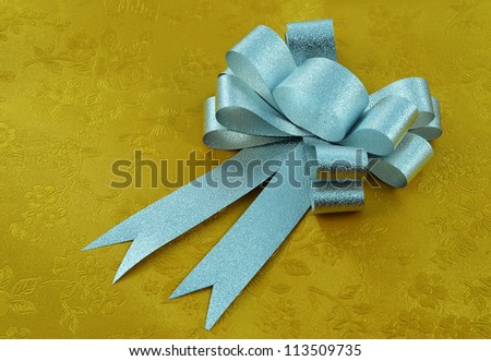 seamless vector golden texture with silver ribbon.
