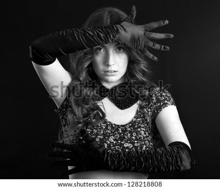 Beautiful woman in long gloves.