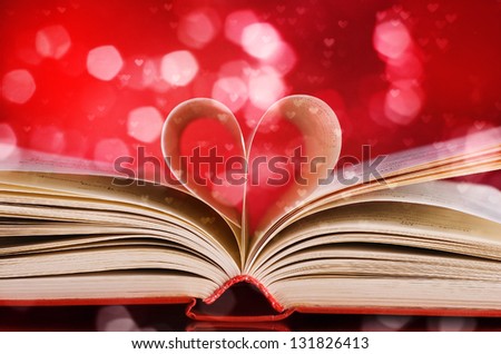 pages of a book curved into a heart shape