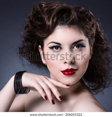 Fashion Model Girl portrait. Red Sexy Lips and Nails closeup. Manicure and Makeup. Make up concept. Beauty woman face