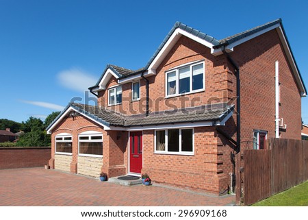 English detached house with red door
