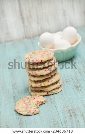 Stack of colorful confetti cookies with eggs