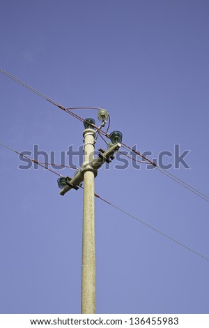 Voltage cable on wooden pole, urban construction and lighting