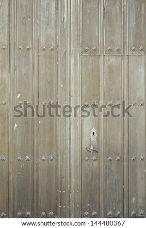 Door with star ornaments carved in wood, construction and architecture