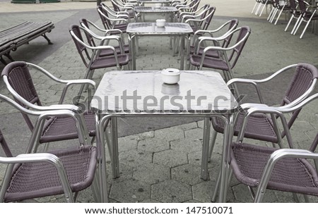Empty terrace bar with tables and chairs, and catering business
