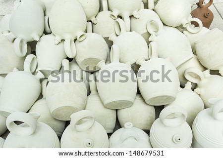 White clay jugs in handicraft market, sell and trade