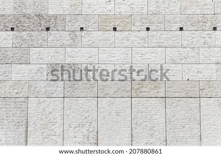 Facade of relief tiles in urban building facade