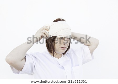 Girl with broken head bandaging, medicine