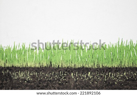 Grass growing in earth painted on wall decor