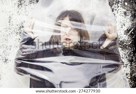 Woman trapped corpse bag, fear and violence
