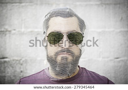 Man covered his face with glasses, fear and fashion