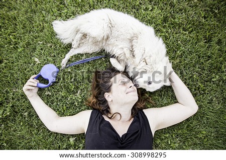 Woman with dog walking in the forest, animals