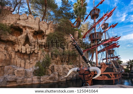 LAS VEGAS, NEVADA - APRIL 11, 2011: Pirate ship at pond near Treasure Island hotel in Las Vegas on April 11, 2011. This Caribbean themed resort has an hotel with 2,884 rooms
