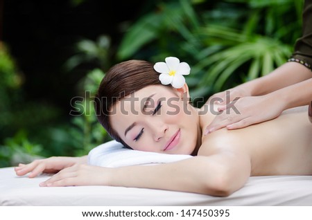 Beautiful Asian woman doing spa massage