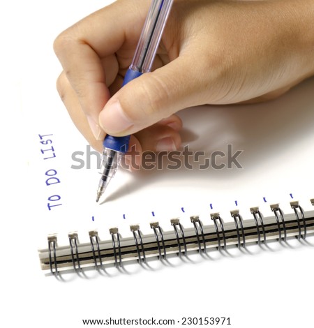 woman hand writing with pen on notebook write to do word over white background