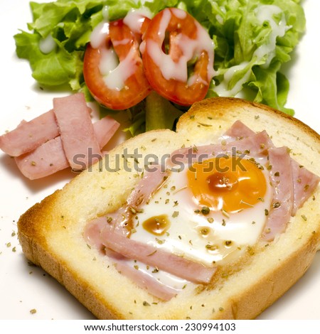breakfast food menu egg in a hole with salad