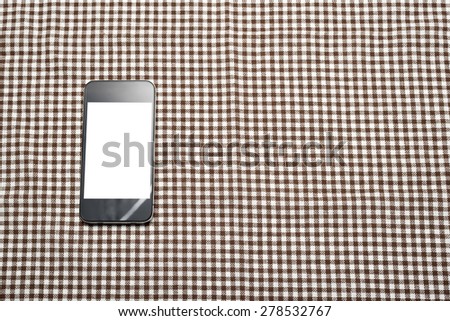 smart phone on kitchen towel background
