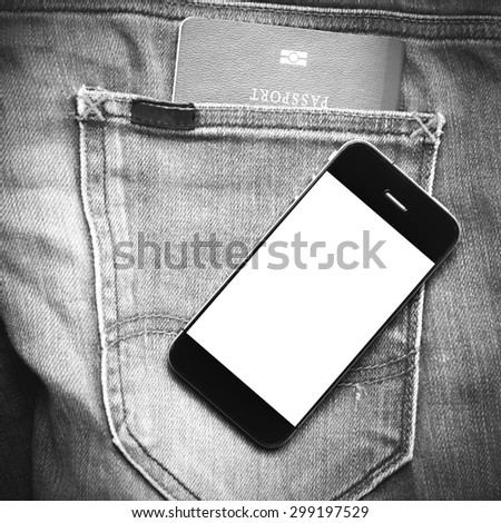 passport in jean pocket with smart phone black and white tone color style