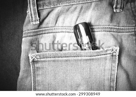 screwdriver in jean pocket pants black and white tone color style