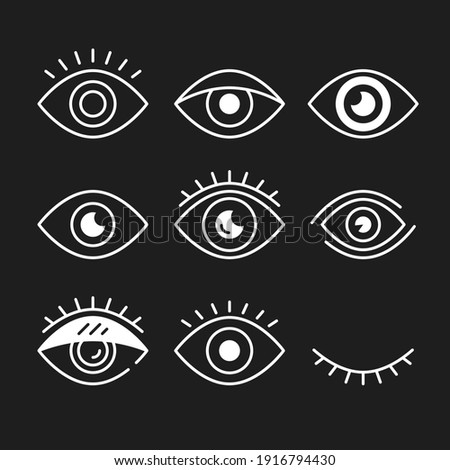 Eye icons set. White eye symbols isolated on black background. Vector line icons