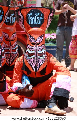 LOEI, THAILAND - JUNE 12, 2010: Ghost Festival (Phi Ta Khon) is a type of masked procession celebrated on Buddhist merit- making holiday known in Thai as\