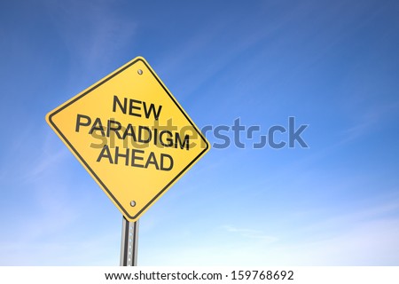 Yellow road warning sign , New Paradigm Ahead