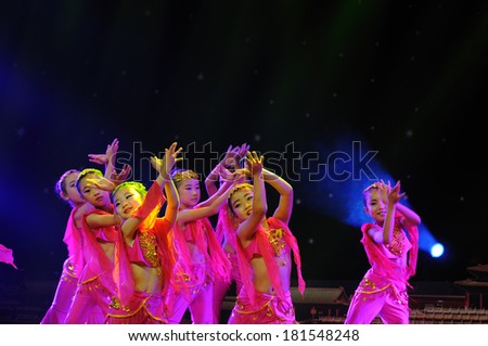 SHIJIAZHUANG CITY, CHINA - JULY 7: On July 7, 2012 in Shijiazhuang City, China Youth Arts Festival Unidentified group of cute kids performing traditional Chinese Tang Dynasty dance flavor.