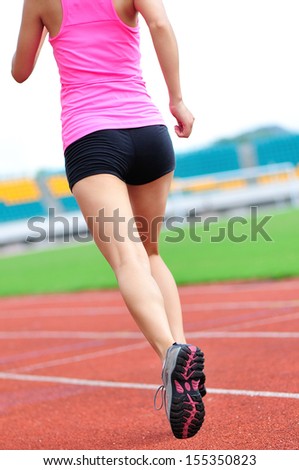 asian woman runner running in the playground outdoor
